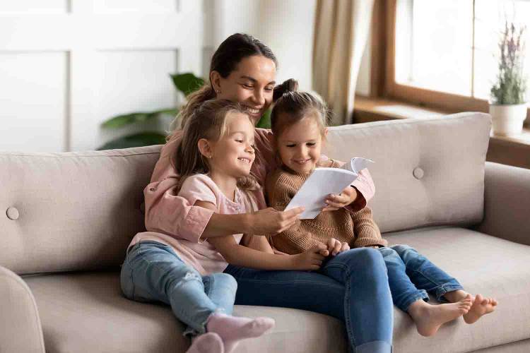 Babysitter watching two kids on vacation