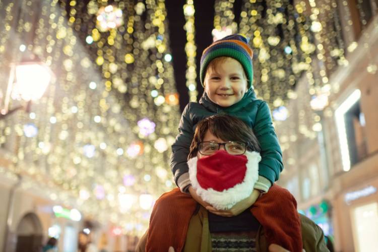 Kid enjoying a holiday light show