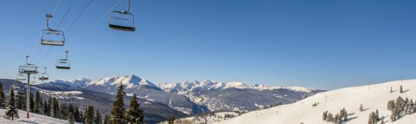 Chair lifts over ski runs in Vail